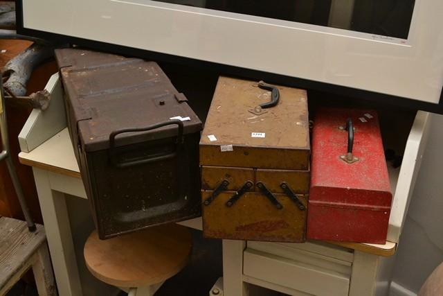 A GREEN METAL AMMO BOX RED METAL TOOLBOX AND A