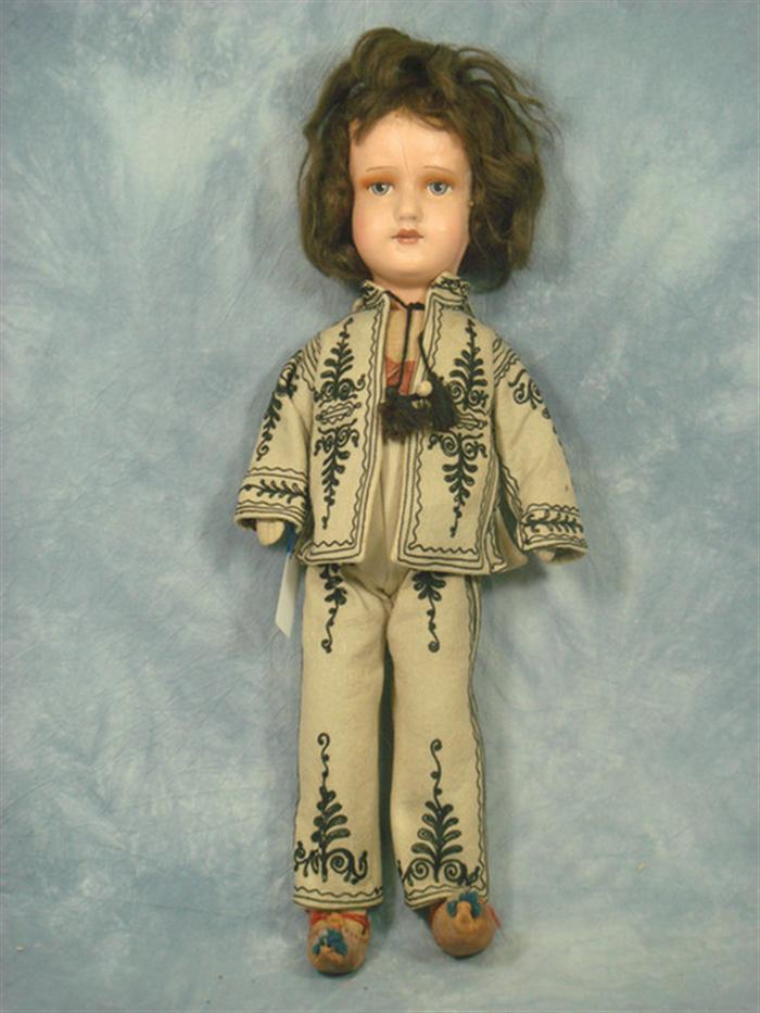 Composition and Cloth Painted face doll 22 inches tall brunette