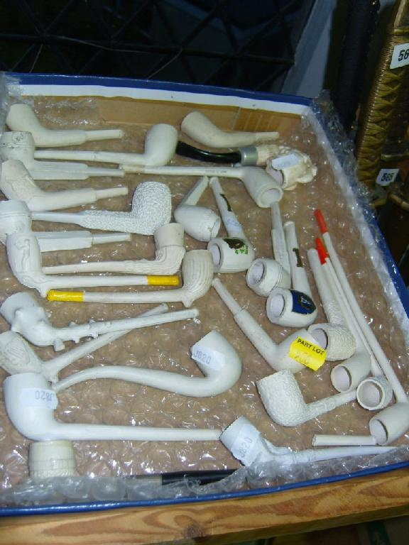 An interesting collection of plaster pipes of various form including
