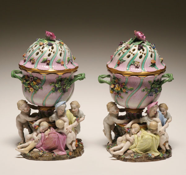 Pair German porcelain covered potpourri urns the vine form double