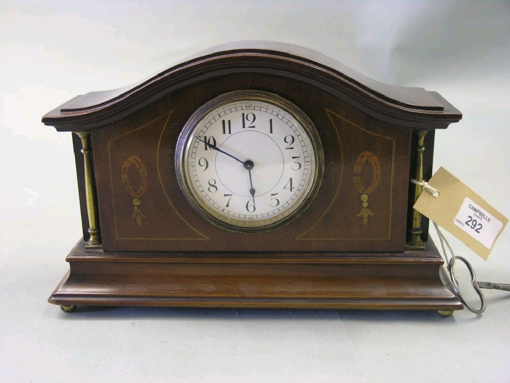 An Edwardian inlaid mahogany mantel clock with enamelled dial French