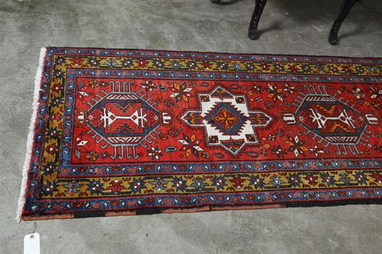 ORIENTAL STYLE RUNNER Red ground with yellow and blue borders