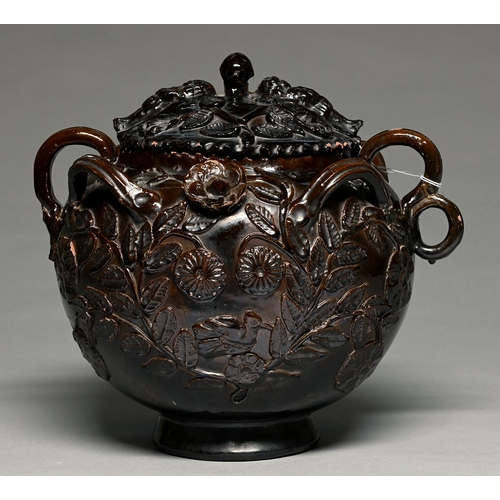 An unusual lead glazed earthenware wassail pot and cover late