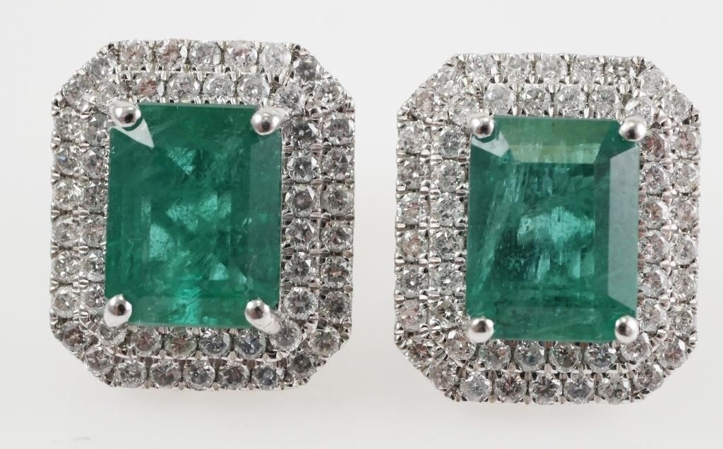 Platinum with faceted emeralds octagonal step cut approx 4 13