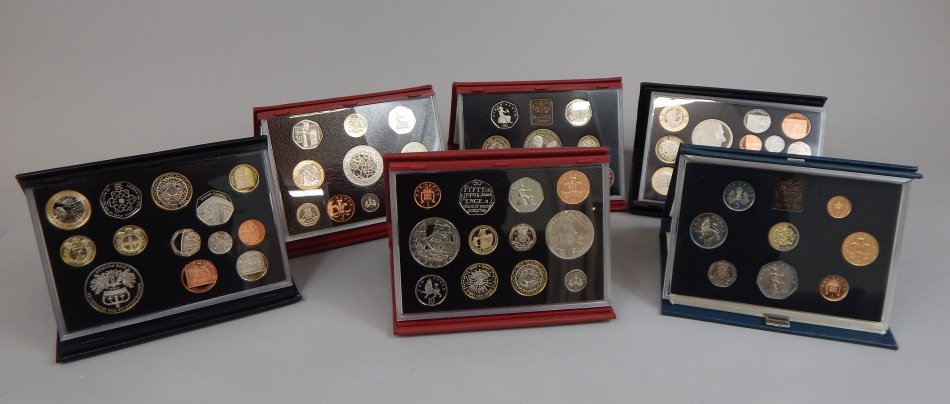 Various Royal Mint proof coin sets for the years 2001
