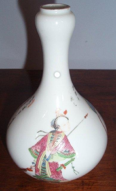 A Chinese vase of pear shape decorated a warrior and