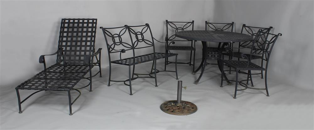 SUITE OF BLACK METAL OUTDOOR FURNITURE comprising a circular table