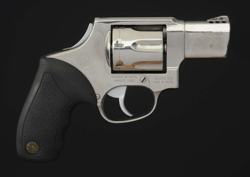 Serial No QI556169 with a 2 barrel length Polished stainless