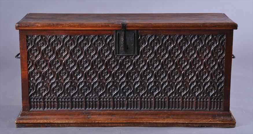 GOTHIC STYLE IRON MOUNTED CARVED WALNUT CASSONE The hinged top