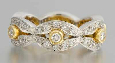A Platinum 18k and Diamond Eternity Band Platinum and 18k