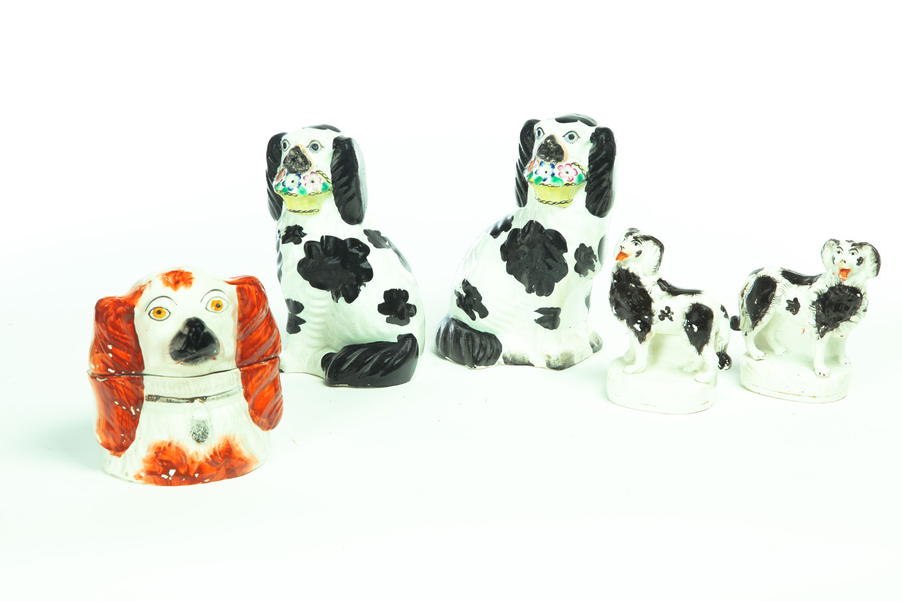 FIVE STAFFORDSHIRE DOGS England 2nd half 19th century Pair of