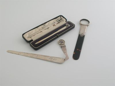 Four small letter openers knives an Edwardian tortoiseshell mounted example