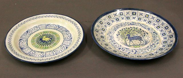 Two Royal Doulton shallow bowls one with central roundel with