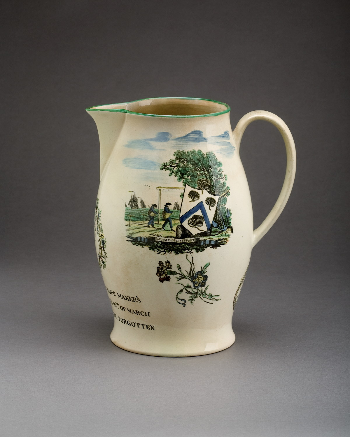 ENGLISH CREAMWARE ENAMEL DECORATED AND BLACK TRANSFER PRINTED JUG PROBABLY