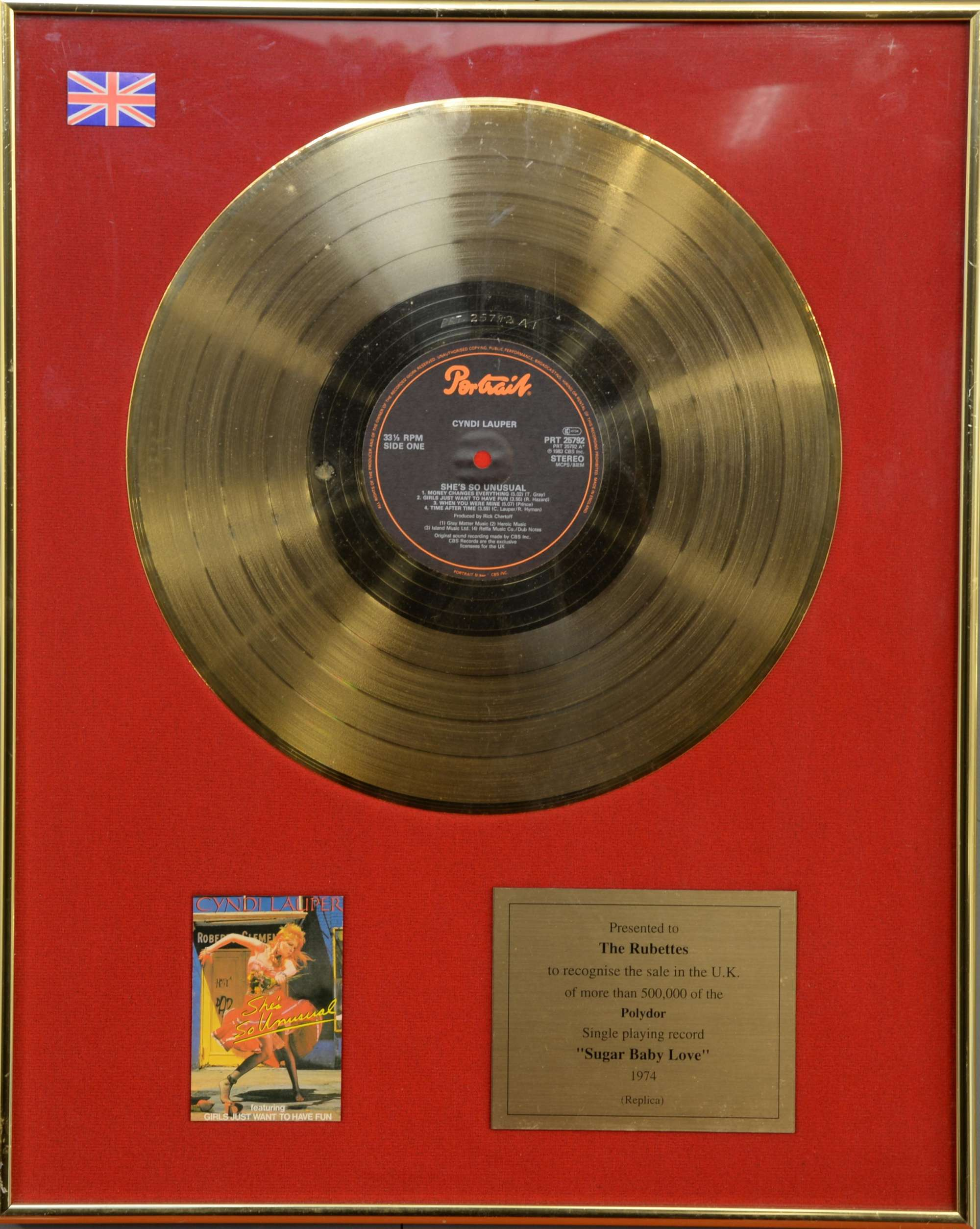 Cyndi Lauper Gold disc presented to The Rubettes to recognise