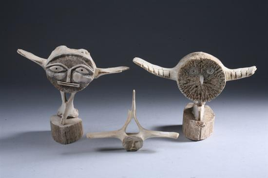 THREE INUIT CARVED WHALE BONE FIGURES 20th century Carved whale