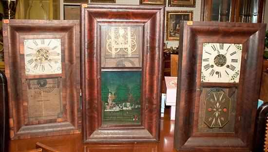 Three American Classical mahogany ogee clocks as is Estimate 100