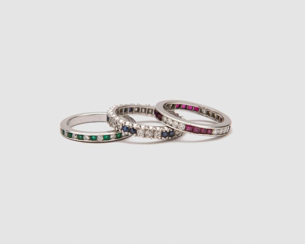 Three Platinum Diamond and Gemset Bands Three Platinum Diamond and