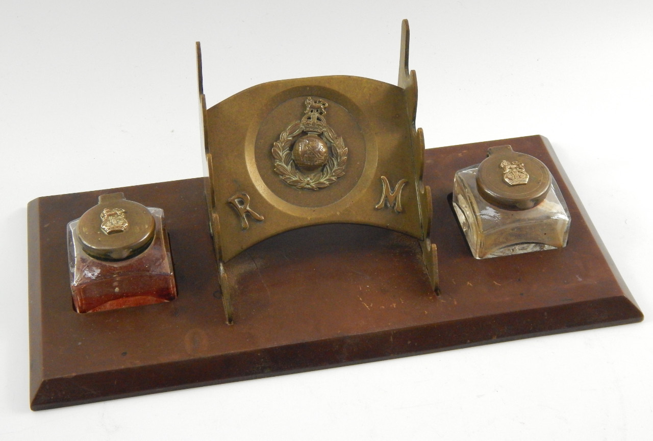 A Royal Marines desk stand early 20thC with a brass