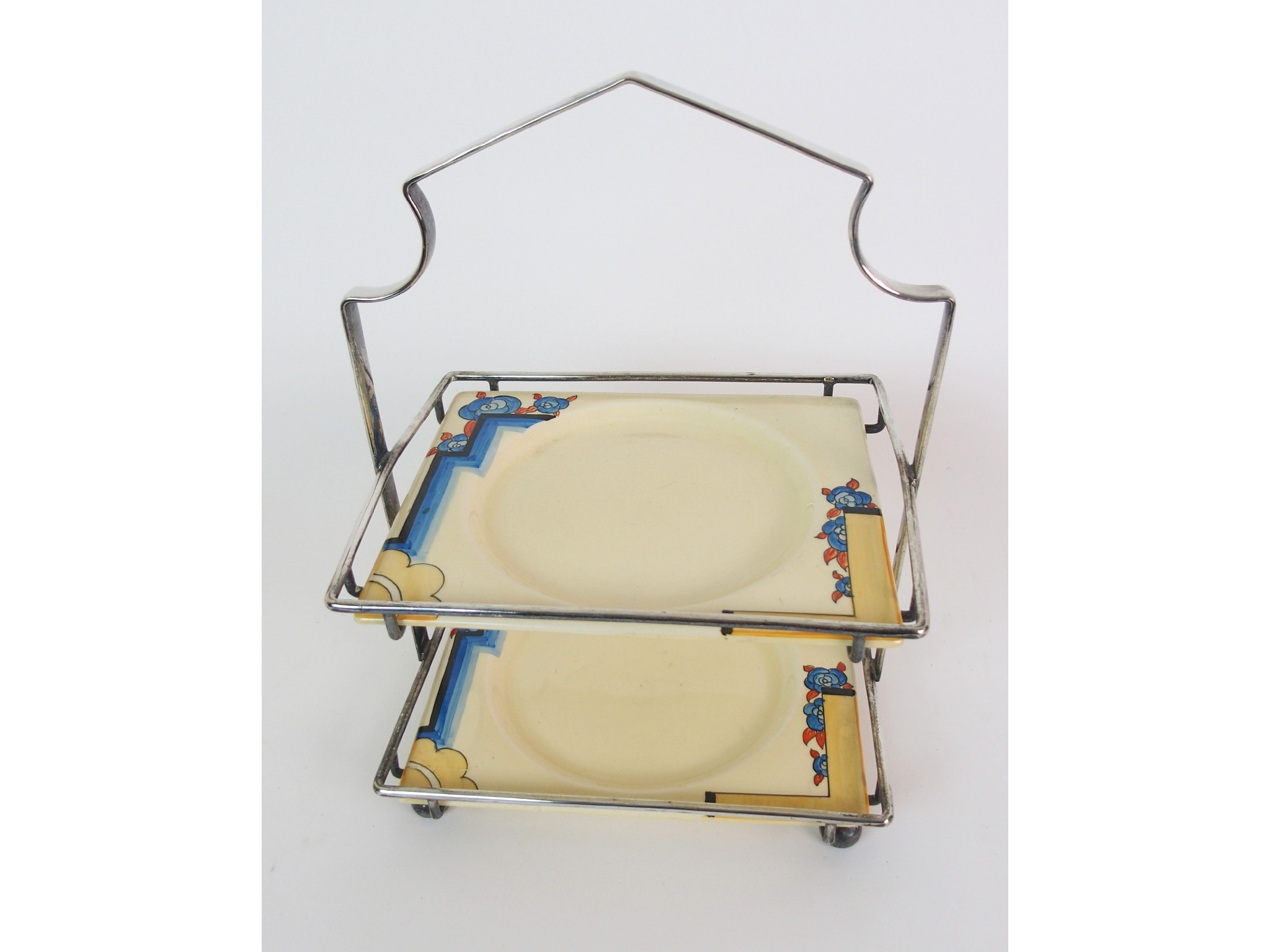 A pair of Clarice Cliff Bizarre plates in two tiered