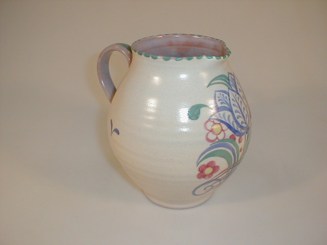 A Carter Stabler Adams Poole pot bellied jug decorated with