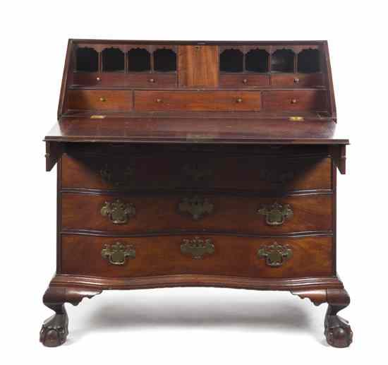 An American Chippendale Style Mahogany Slant Front Desk having a