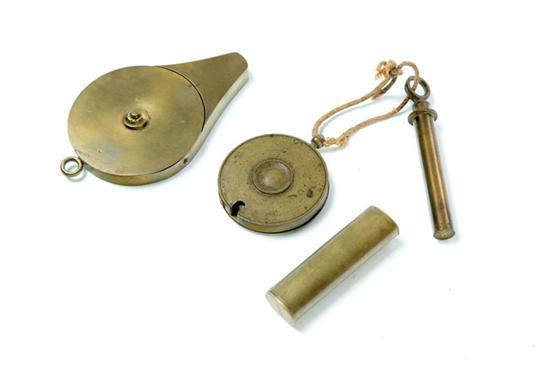 GROUP OF THREE BRASS ITEMS England 19th century Circular percussion