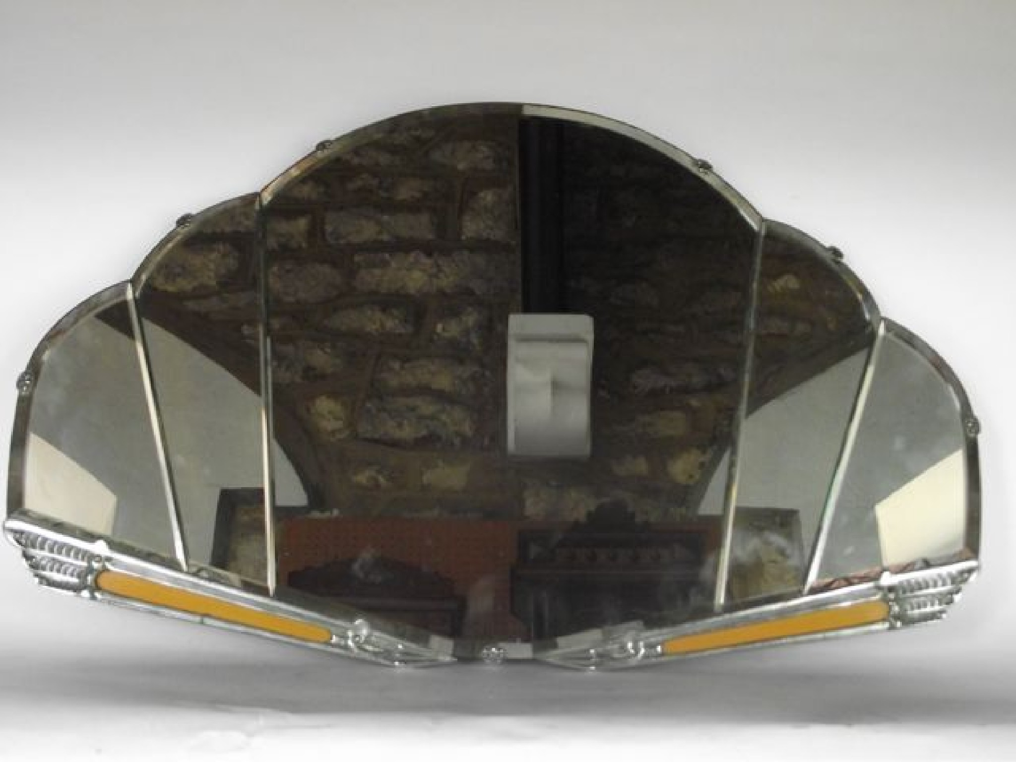 A D shaped wall mirror in the Art Deco manner