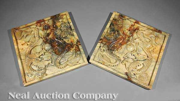 A Large Pair of Chinese Carved Stone Plaques each mottled