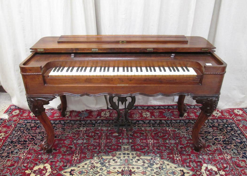 A VICTORIAN ROSEWOOD MELODEON American c 1865 a piano style