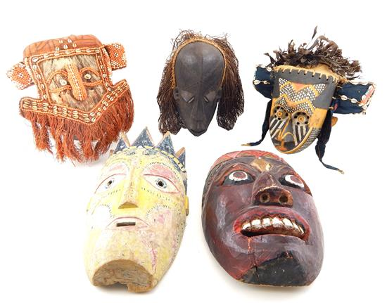 TRIBAL Five carved African masks two Kuba tribe headdresses the