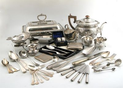 A mixed lot of items comprising silver items a sauce