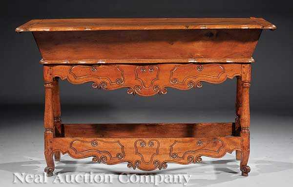 A Good French Provincial Carved Walnut Dough Box on Stand