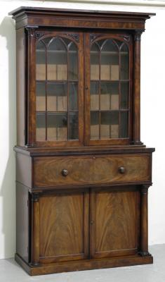 A MAHOGANY SECRETAIRE BOOKCASE the moulded cornice and protruding frieze