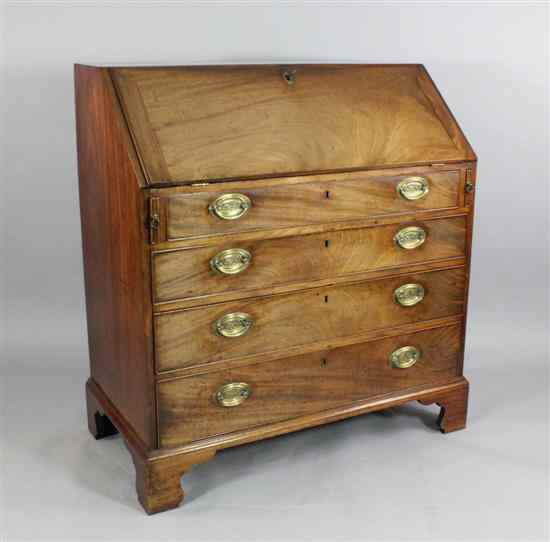 A George III mahogany bureau with four graduated long drawers