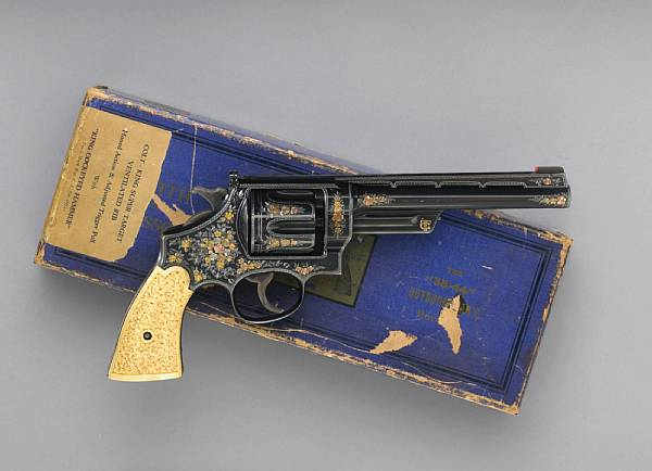 A custom engraved and gold inlaid Smith amp Wesson 38