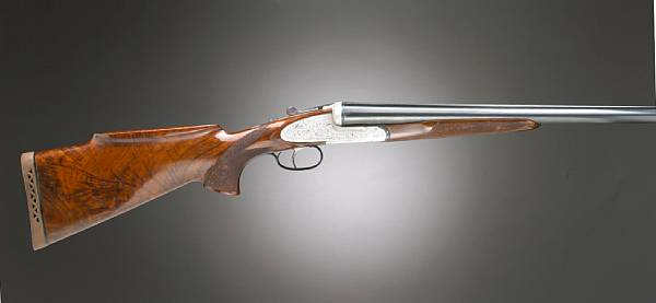 A 12 gauge Italian double barrel sidelock ejector gun Serial