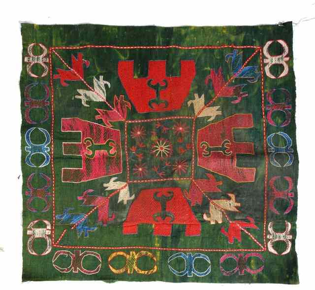 AN UZBEK LAKAI SILK EMBROIDERED PANEL decorated a stylistic design