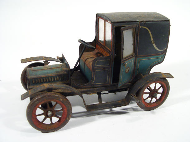 Tinplate clockwork motor car with blue panels marked ASGW to