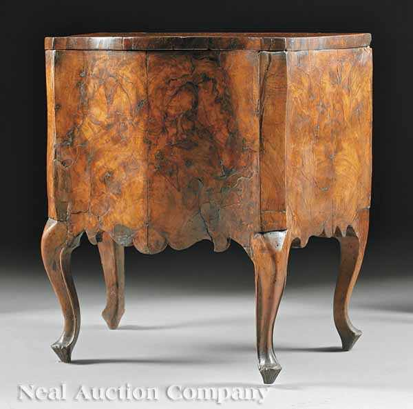 An Italian Rococo Style Figured and Burled Walnut Commode late