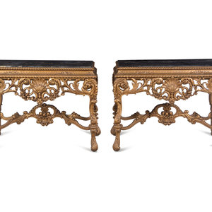 A Pair of Italian Baroque Style Giltwood Composition Marble Top