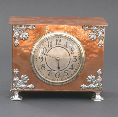A Duchess of Sutherland Cripples Guild copper mantle clock model