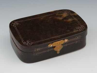 A Tortoise Shell Snuff Box The rectangular box with hinged