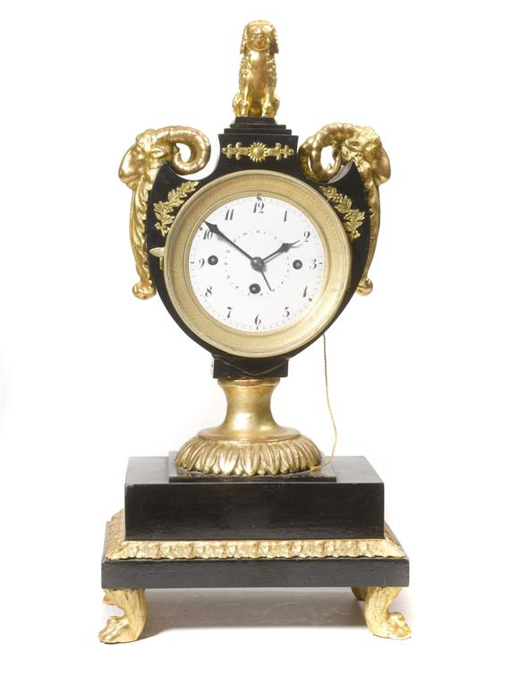 A VASE SHAPED CLOCK with date Empire Biedermeier Austria circa