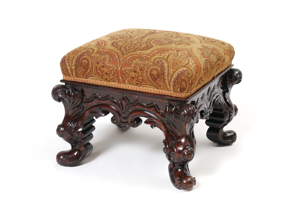 EXQUISITELY CARVED ROSEWOOD OTTOMAN Tradition holds that this ottoman was