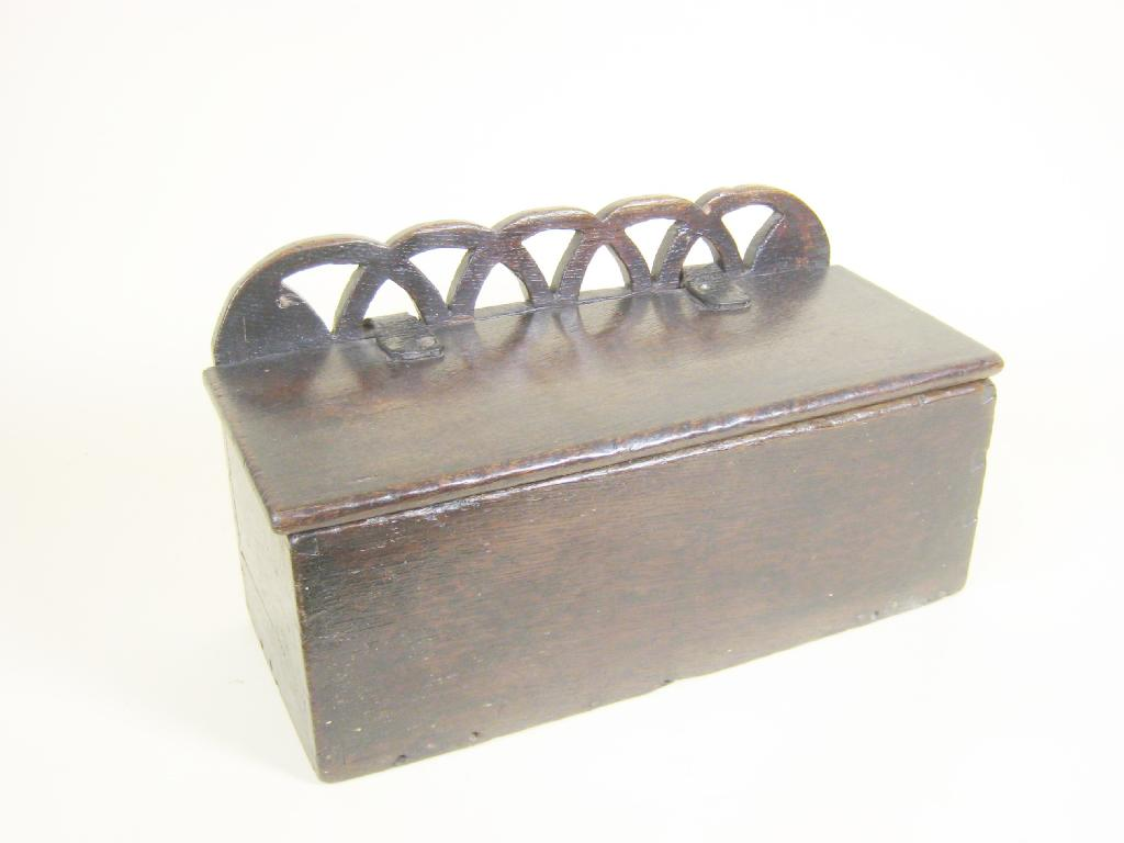 A 17th Century oak Candle Box with raised and piered