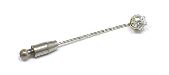 A DIAMOND PIN circa 1930 Yellow and white gold Needle