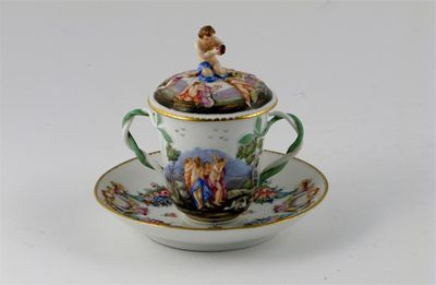 A Doccia style chocolate cup cover and stand moulded with