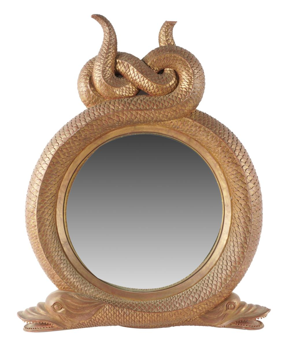 CARVED GILTWOOD WALL MIRRORthe flat round mirror plate within a