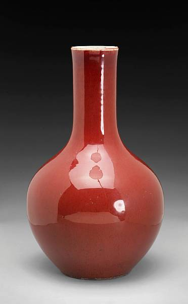 A copper red glazed porcelain stick neck vase 19th Century
